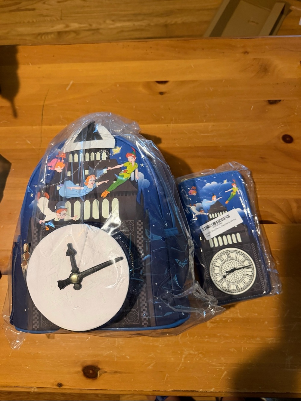 Loungefly Peter Pan Glow in the Dark backpack and wallet